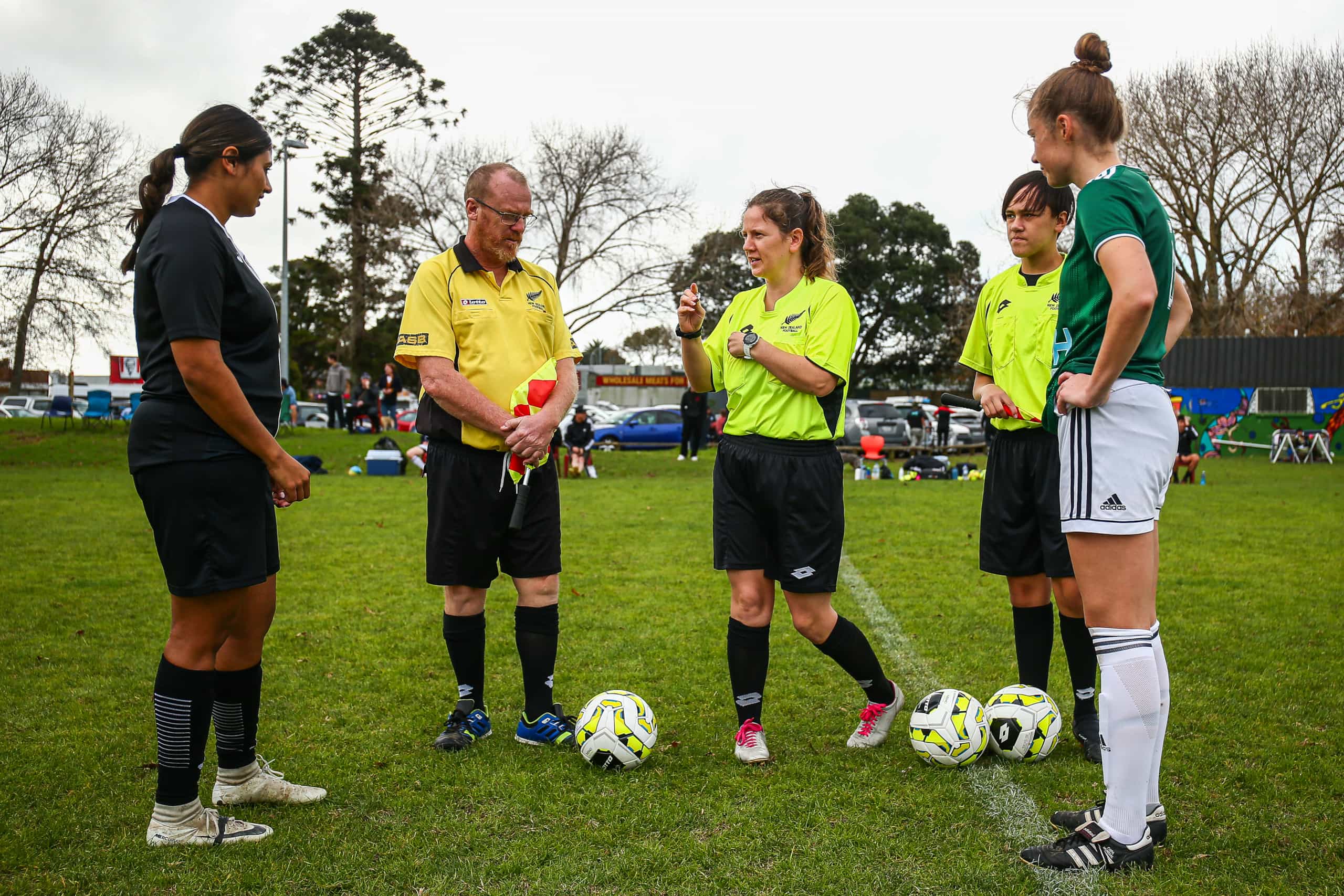 Manukau united Captain Jasleen Kaur, Onehunga Sports Captain Hannah Carter and Referee Tiffany Kawana-Waugh[C] Assistant Phillip Parks [L] and assistant Grace Parks [R] during the coin toss, LOTTO NRFL Womens Championship 2023, Manukau United v Onehunga Sports, Walter Massey Park, Auckland, Sunday 28th May 2023. Photo: Andrew Skinner / www.phototek.nz