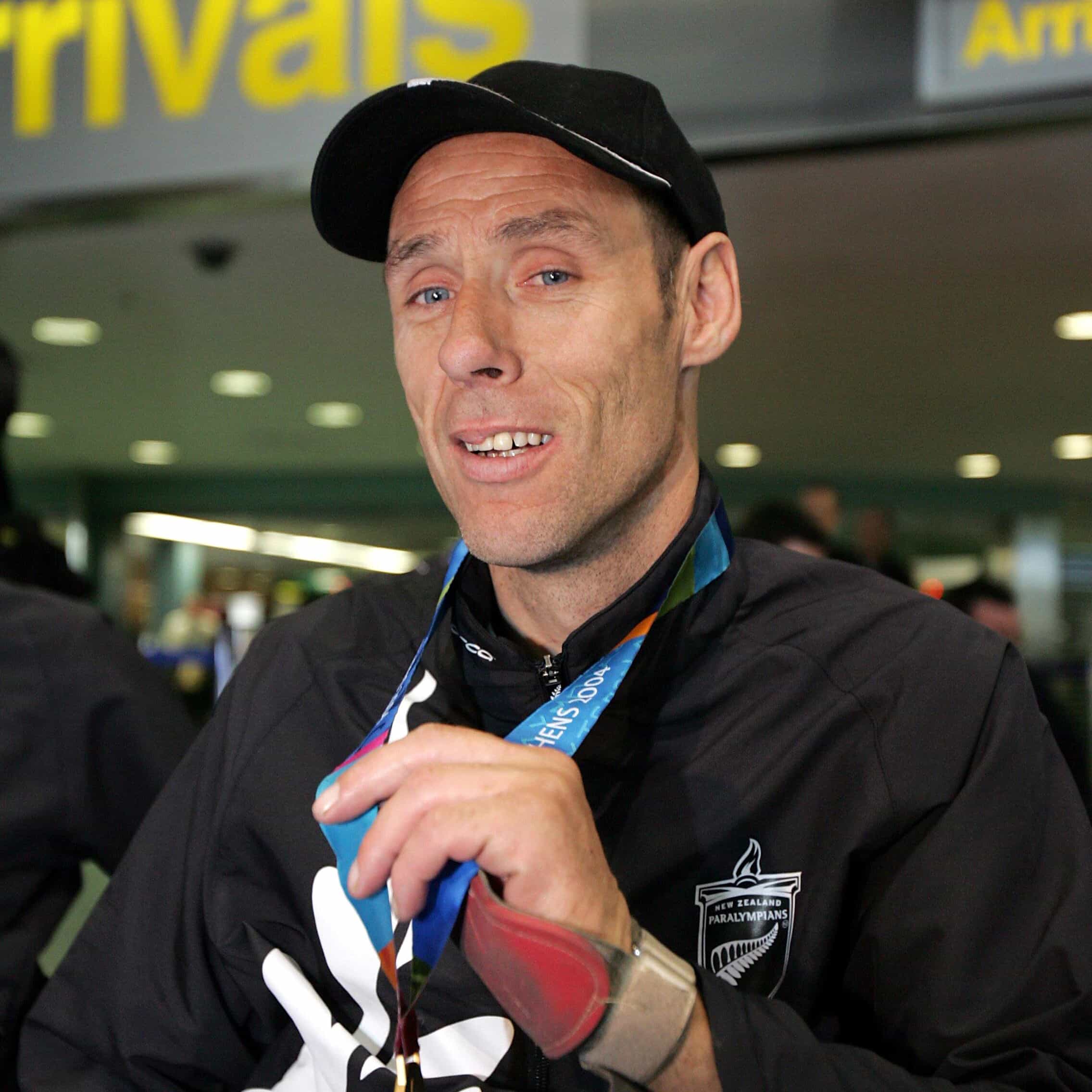 Wheelblack captain, Bill Oughton at the Auckland International Airport as the New Zealand Paralympic Team arrive home from Athens, Sunday October 3rd 2004. 
PHOTO: Hannah Johnston/PHOTOSPORT