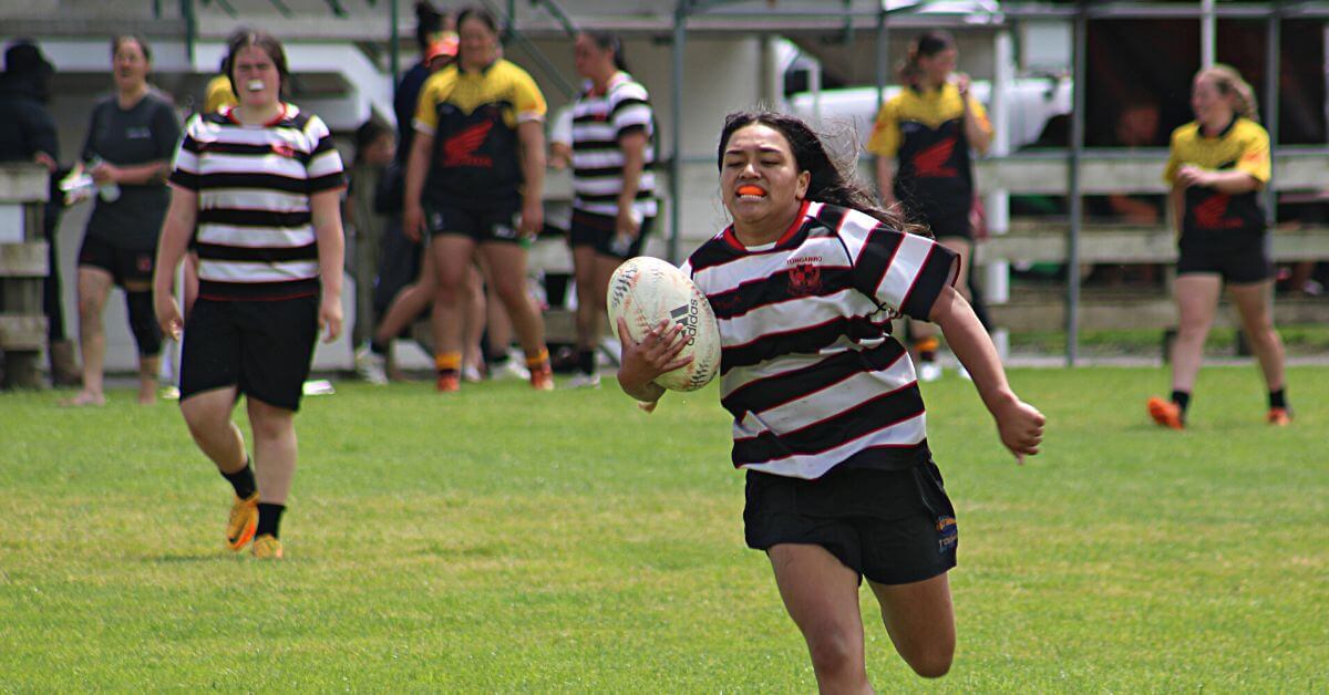 Senior womens rugby player in King Country scoring a try